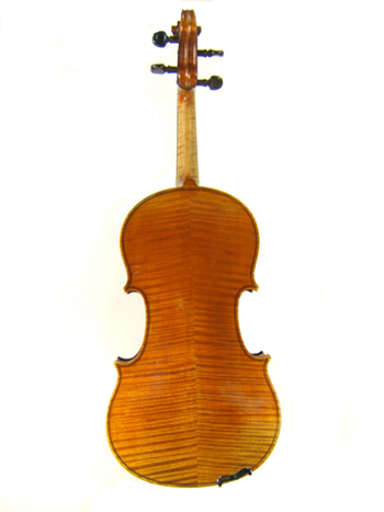 The back of a French violin labeled Charles Gaillard